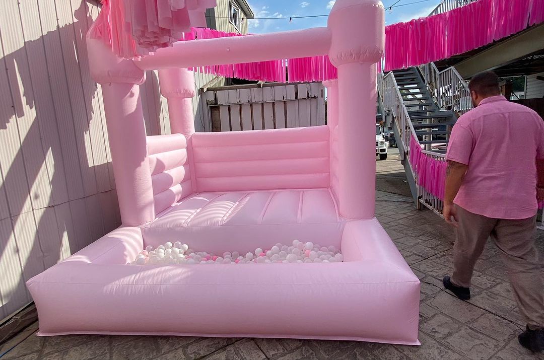 11ft x 11ft Pink Bouncy Castle + Attached Ball pit