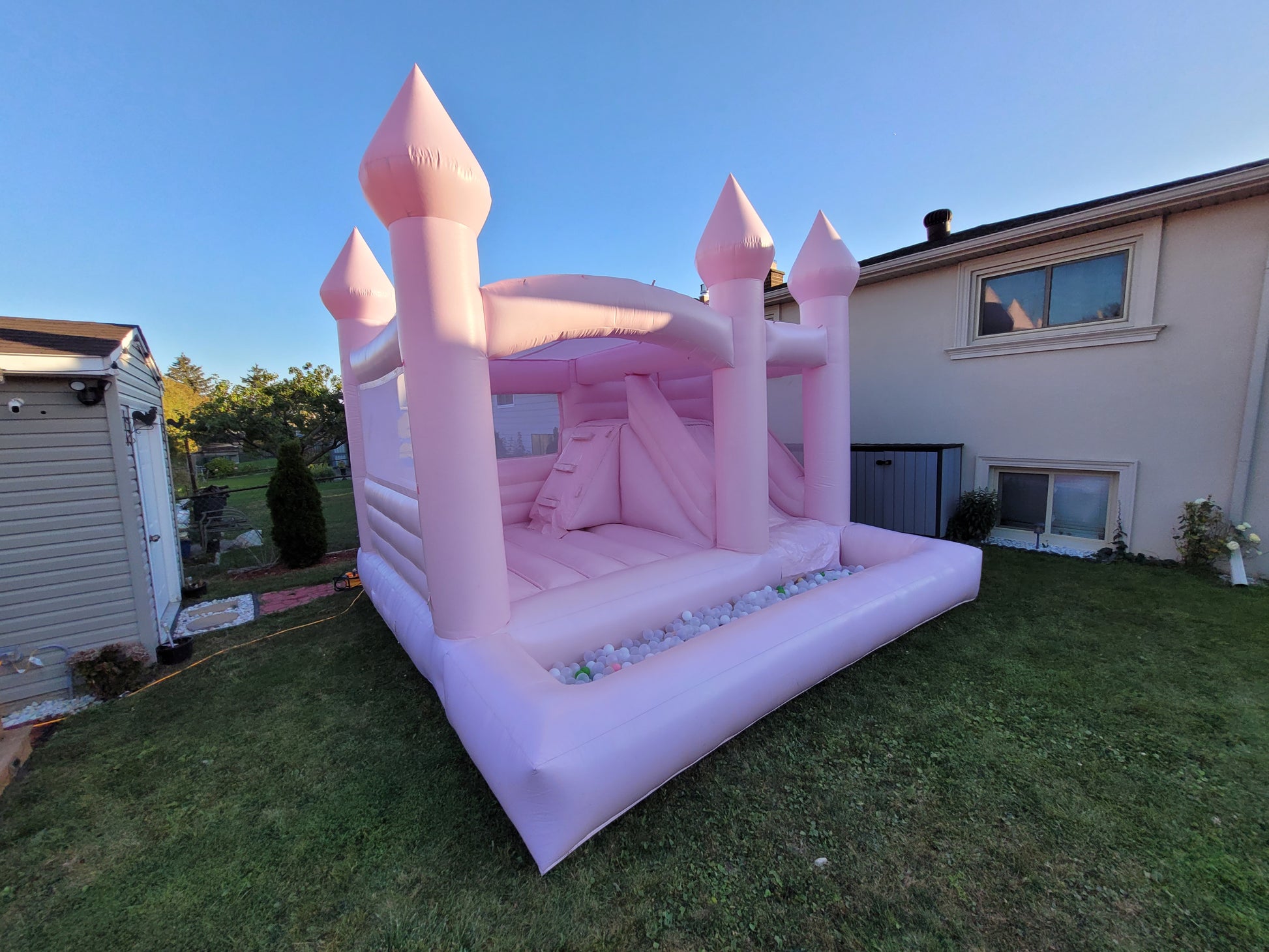 14ft x 14ft Pink Bouncy Castle + Attached Ballpit & Slide - Jayde's Bouncy Castle Rentals