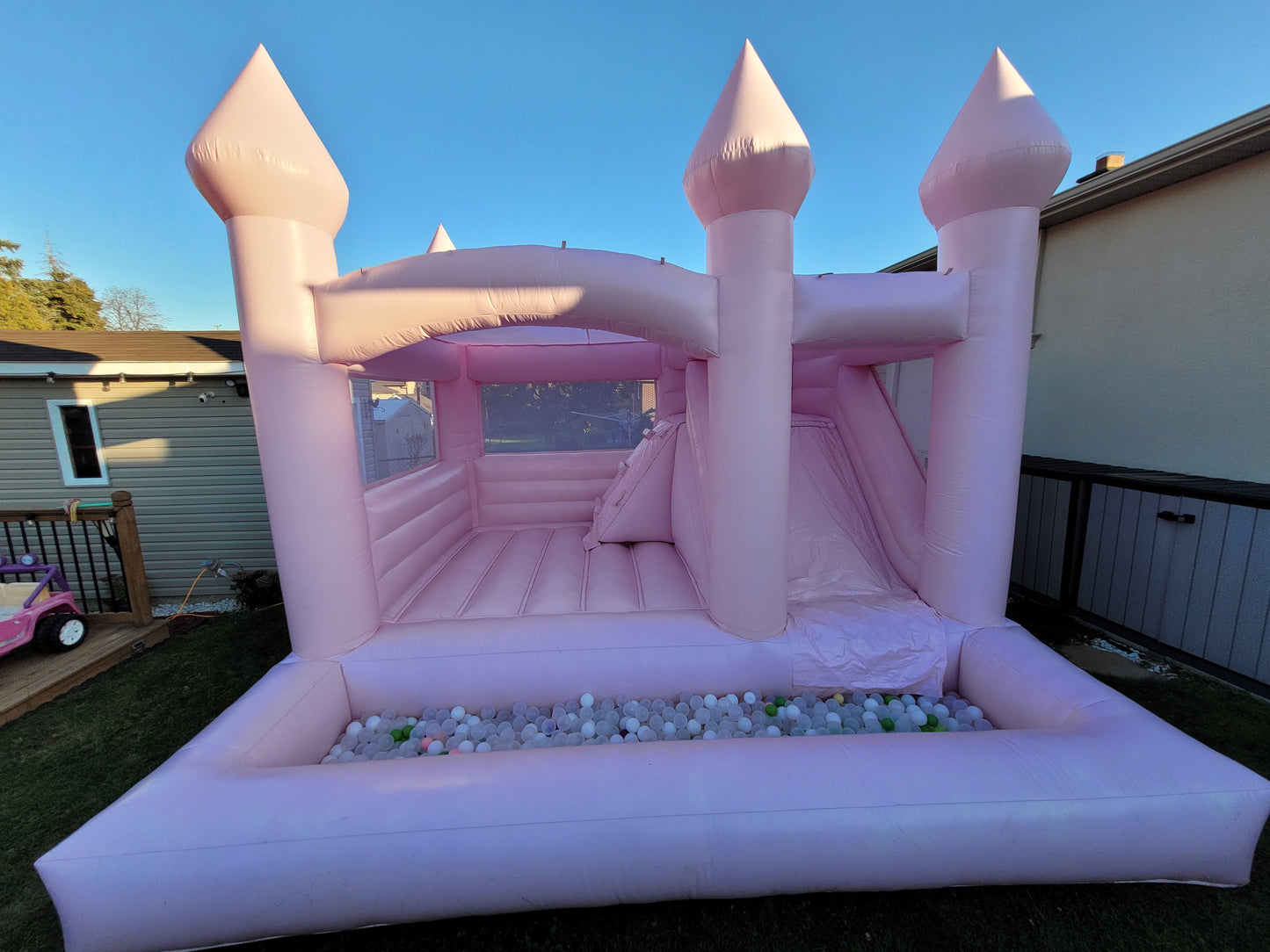 14ft x 14ft Pink Bouncy Castle + Attached Ballpit & Slide - Jayde's Bouncy Castle Rentals